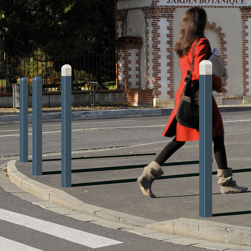 Steel bollards installed on a footpath to protect pedestrians from vehicles