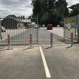 Lift assisted SQ20 telescopic bollards protecting gates