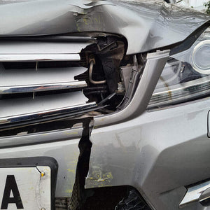 A Mercedes Benz saloon after trying to drive through the R14 telescopic bollard 