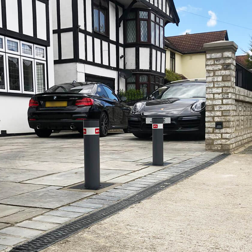 Automatic rising bollards on a residential driveway