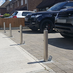 Telescopic bollards installed on a driveway