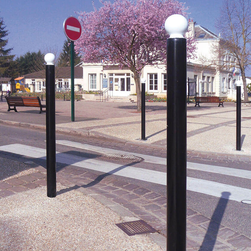 Ornamental steel bollards on a public footpath