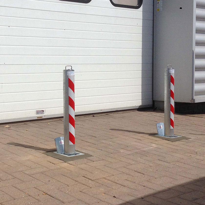 Telescopic anti-ram-radi bollards installed to protect roller shutters