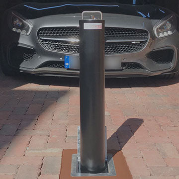 Telescopic security bollard protectin an AMG Mercedes sports car