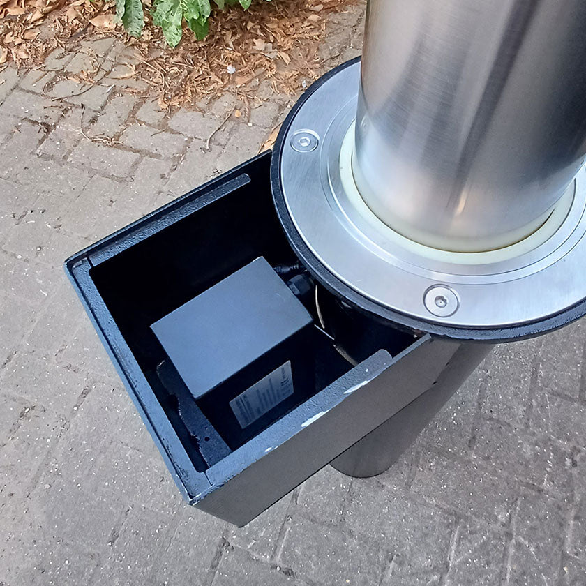 Battery enclosure removed from top of casing