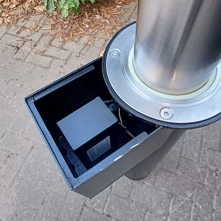 Battery enclosure removed from top of casing