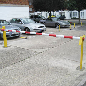 Manual arm barrier in a Yellow powder coated finish.