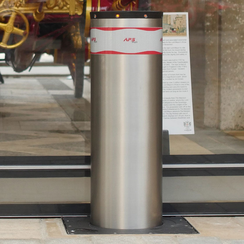 X-Pass B K4 Anti terrorist automatic rising bollard in stainless steel.