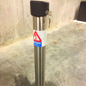 Stealth fold down parking post in a 304-grade stainless steel finish