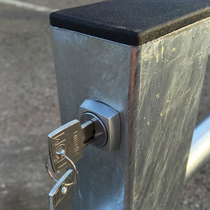 I-Frame parking barrier key and lock location.
