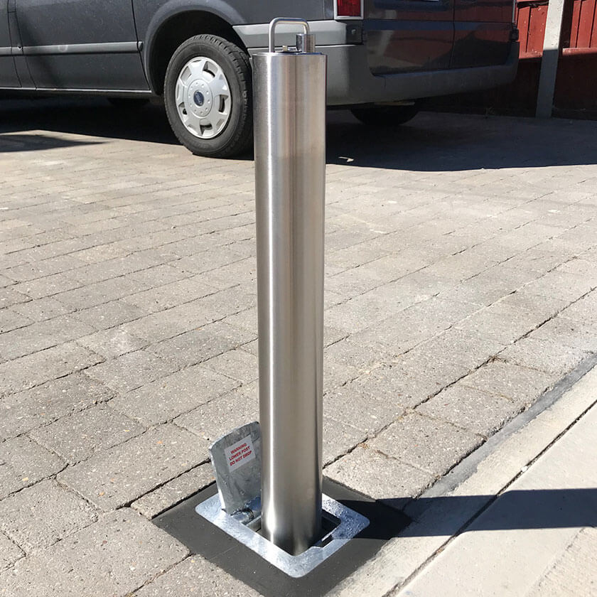 SS14 Stainless steel telescopic bollard on a private driveway