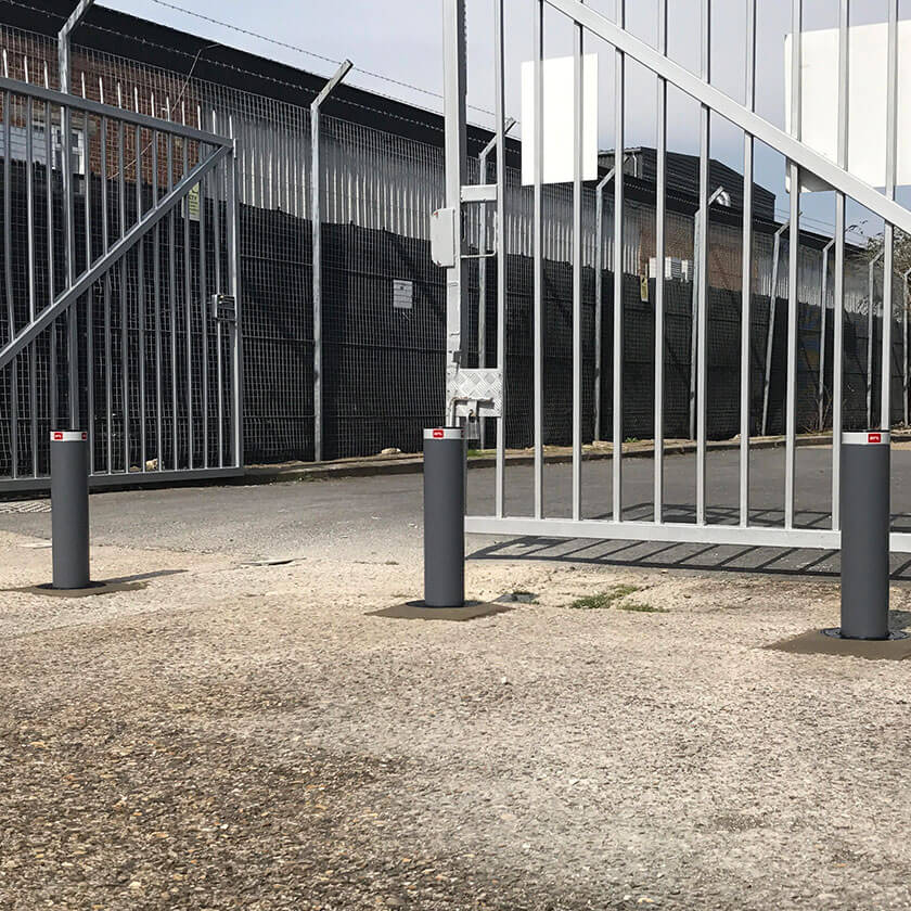 Easy-B semi automatic rising bollards at a gated entrance.