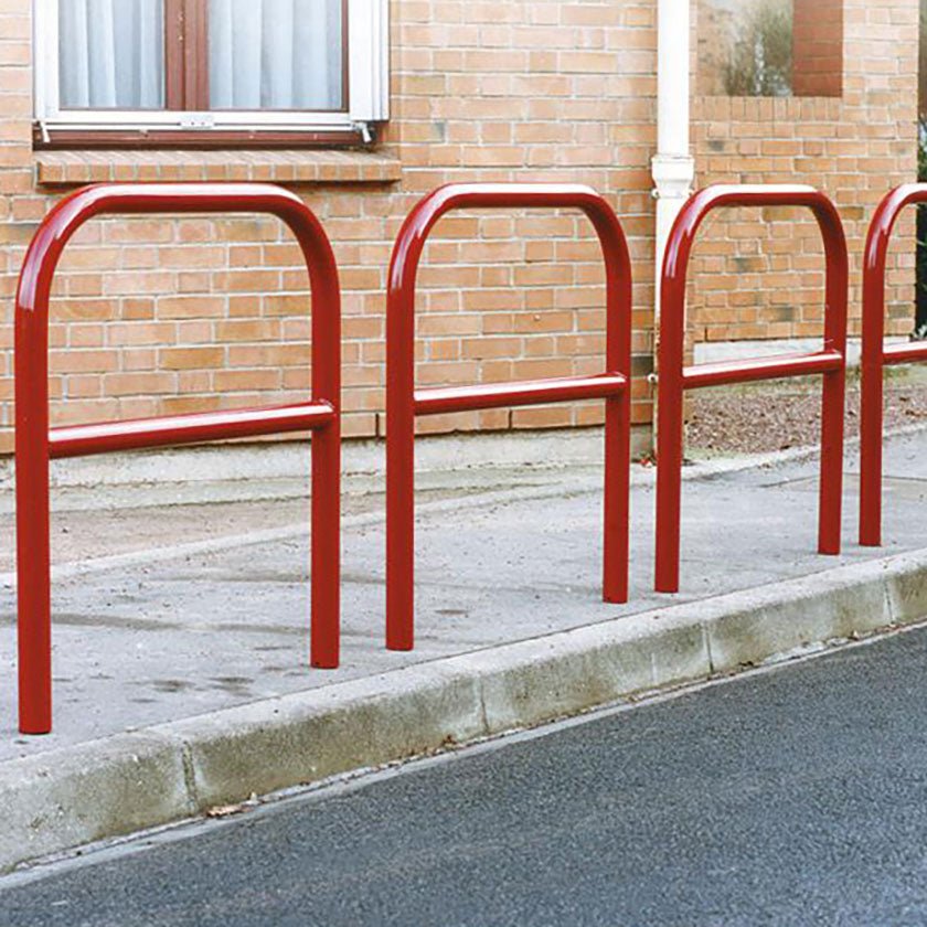 60mm static steel hoop barriers with a centre rail in Red.