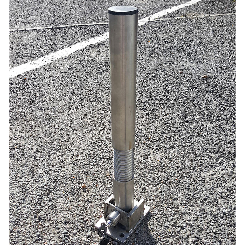 Bendy flexible fold down parking post in a stainless steel finish.