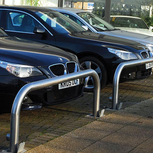 76mm tube stainless steel removable hoop barriers on a vehicle forecourt.