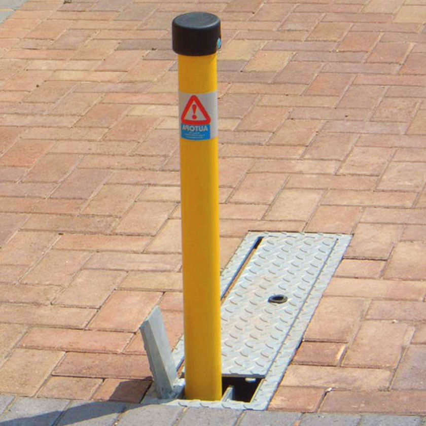 Stealth fold down parking post in a Yellow powder coated finish