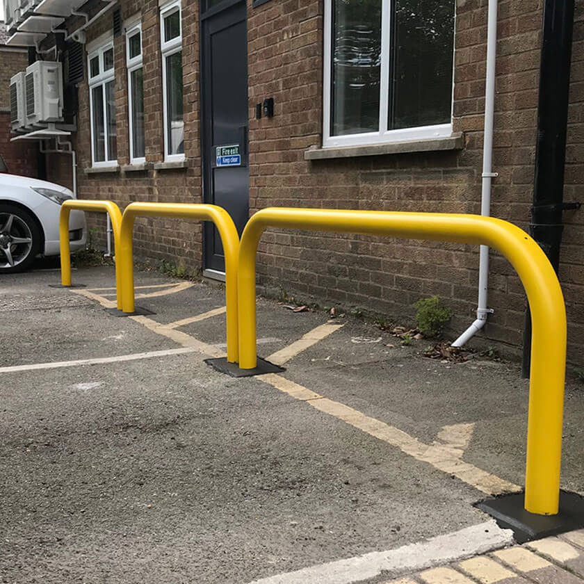 90mm tube static steel hoop barrier in a Yellow powder coated finish.