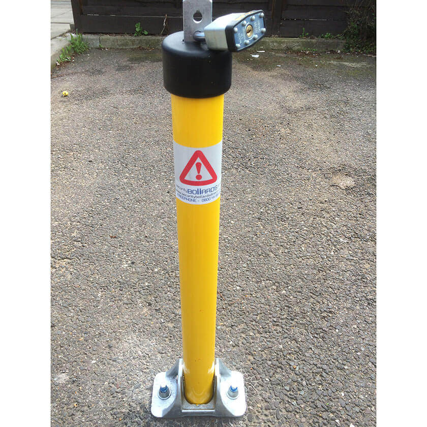 Top Lock fold down parking post in a Yellow powder coated finish